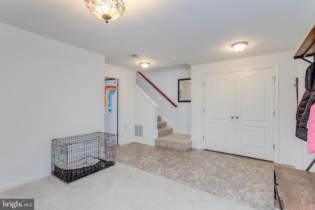 45 Private Ct, Bunker Hill, WV 25413 - entryway featuring stairs and carpet floors