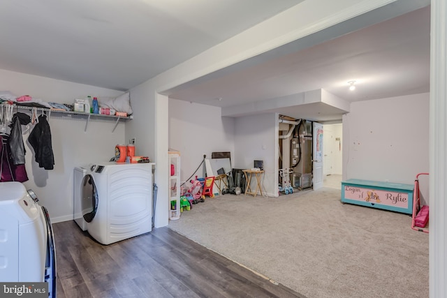 45 Private Ct, Bunker Hill, WV 25413 - washroom with washing machine and clothes dryer, wood finished floors, and heating unit