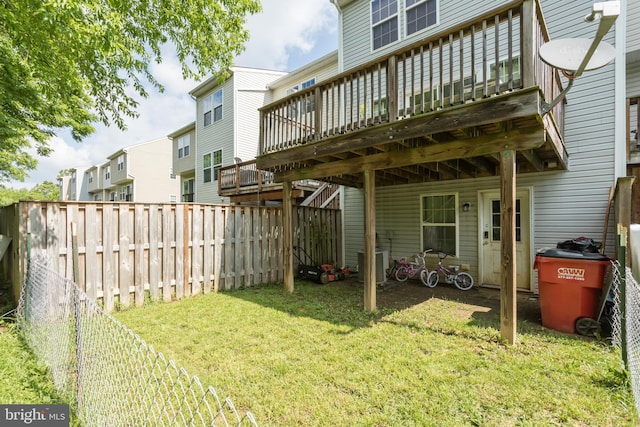 45 Private Ct, Bunker Hill, WV 25413 - fenced backyard featuring a wooden deck
