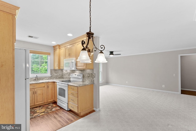 1003 Foxhunt Ter NE Unit 201, Leesburg, VA 20176 - kitchen with white appliances, open floor plan, light brown cabinetry, decorative backsplash, and ceiling fan