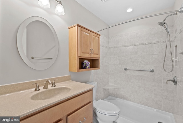 1003 Foxhunt Ter NE Unit 201, Leesburg, VA 20176 - bathroom featuring vanity and a tile shower