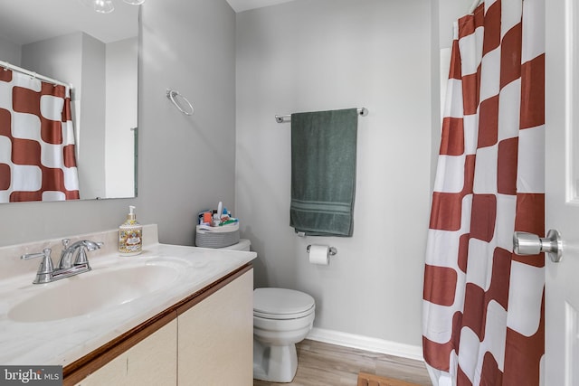 196 Saint Johns Sq, Sterling, VA 20164 - full bath with vanity, wood finished floors, and a shower with curtain
