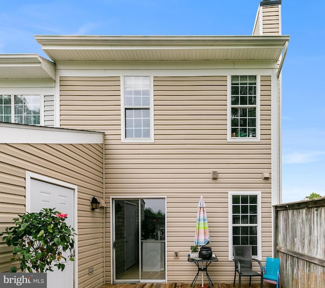 196 Saint Johns Sq, Sterling, VA 20164 - back of property featuring a chimney