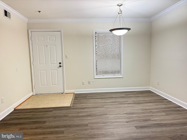 3179 Summit Square Dr Unit 2-B5, Oakton, VA 22124 - unfurnished dining area featuring ornamental molding and wood finished floors