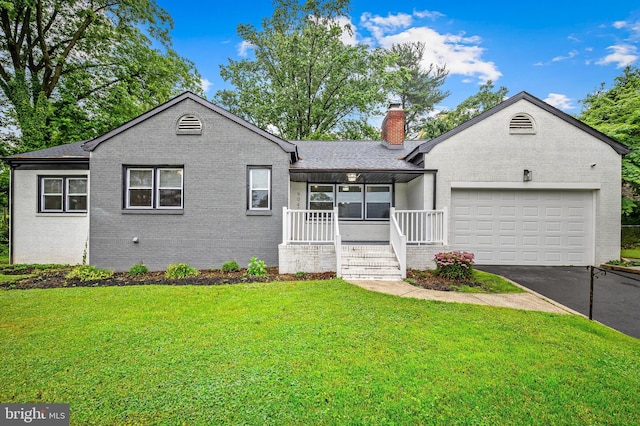 904 Stevenson Ln, Towson, MD 21286 - ranch-style house with brick siding, covered porch, driveway, an attached garage, and a front yard