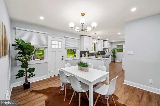 904 Stevenson Ln, Towson, MD 21286 - dining area featuring a chandelier, wood finished floors, and recessed lighting
