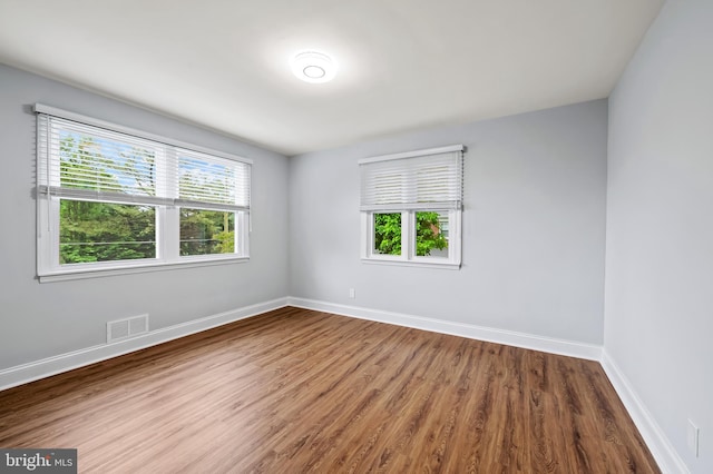 904 Stevenson Ln, Towson, MD 21286 - empty room featuring wood finished floors and baseboards