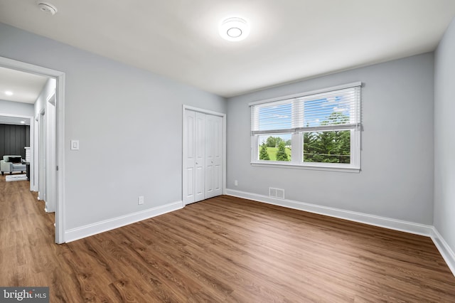 904 Stevenson Ln, Towson, MD 21286 - unfurnished bedroom featuring wood finished floors and a closet