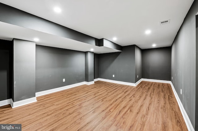 904 Stevenson Ln, Towson, MD 21286 - finished basement featuring wood finished floors and recessed lighting