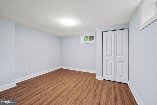 904 Stevenson Ln, Towson, MD 21286 - unfurnished bedroom featuring wood finished floors and a closet