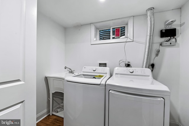 904 Stevenson Ln, Towson, MD 21286 - laundry room featuring washer and dryer and dark wood-type flooring