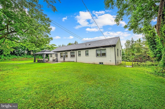 904 Stevenson Ln, Towson, MD 21286 - back of house featuring a gazebo, a patio, and a shingled roof