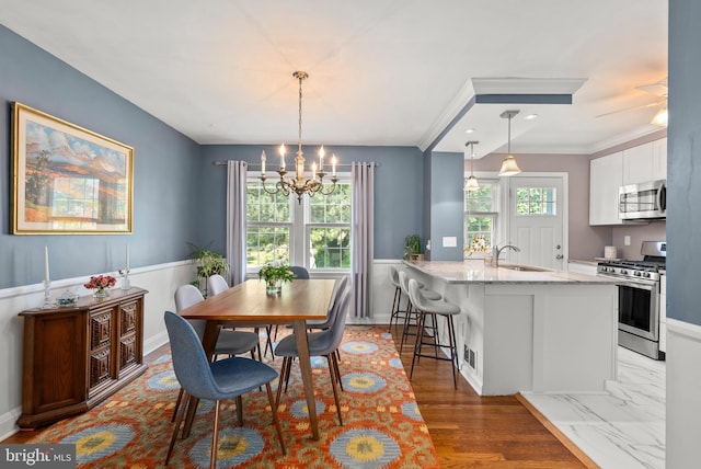 1906 Glen Keith Blvd, Towson, MD 21286 - dining space with a chandelier and ornamental molding