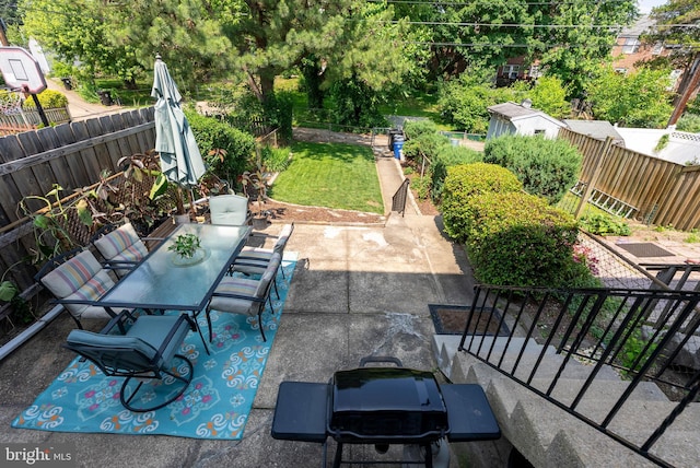 1906 Glen Keith Blvd, Towson, MD 21286 - fenced backyard with outdoor dining space and a patio
