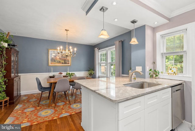 1906 Glen Keith Blvd, Towson, MD 21286 - kitchen with stainless steel dishwasher, white cabinetry, wood finished floors, decorative light fixtures, and a chandelier