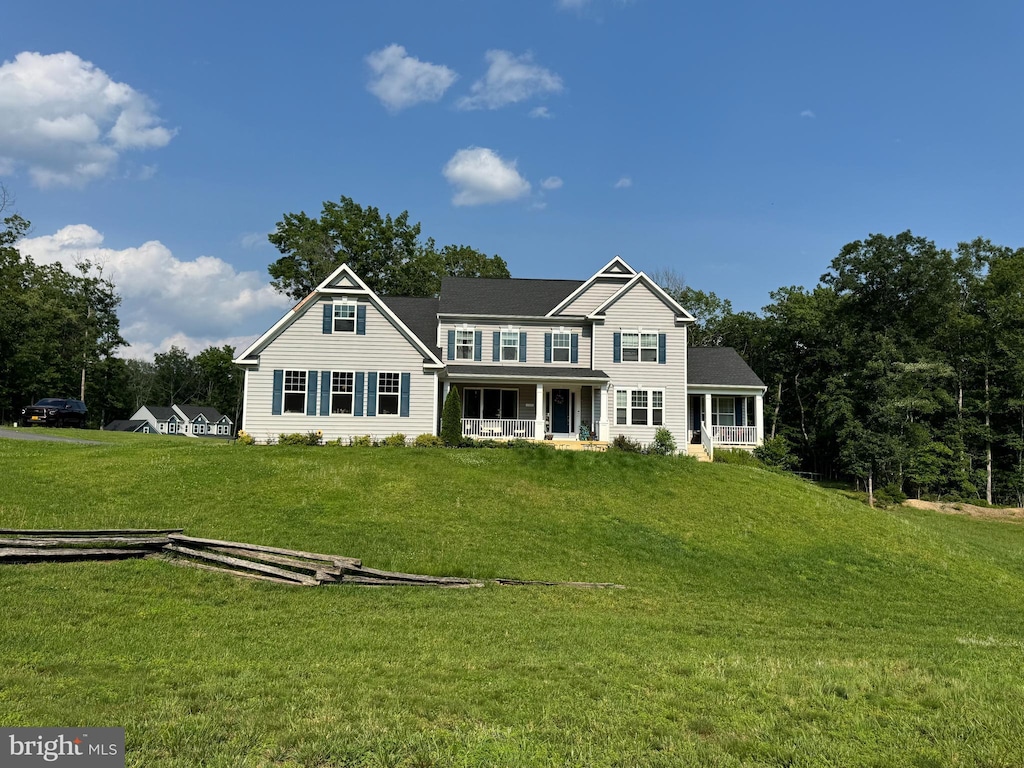 13001 Wipple Ct, Fredericksburg, VA 22407 - view of front facade featuring a front lawn and covered porch