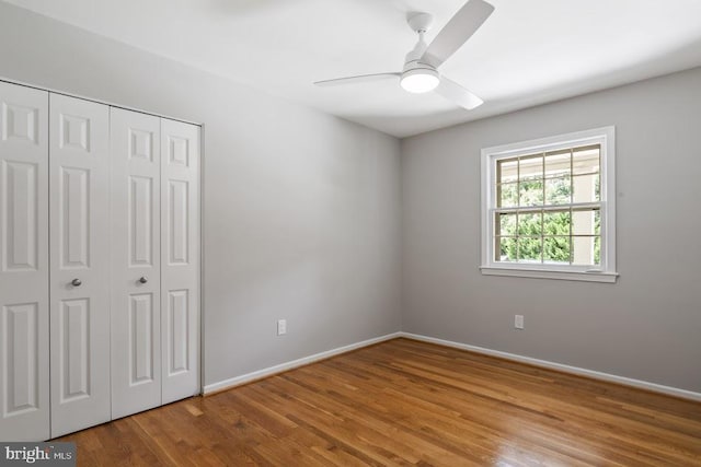 1121 Collingwood Rd, Alexandria, VA 22308 - unfurnished bedroom featuring wood finished floors, a closet, and a ceiling fan