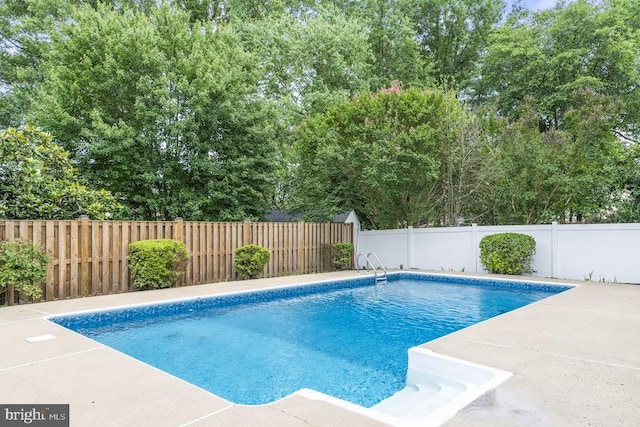 1121 Collingwood Rd, Alexandria, VA 22308 - view of swimming pool with a fenced backyard and a patio area