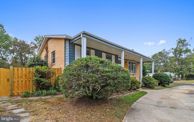 1121 Collingwood Rd, Alexandria, VA 22308 - view of front of house featuring concrete driveway