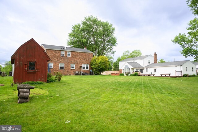 744 Caley Rd, King Of Prussia, PA 19406 - view of grassy yard featuring a barn and an outbuilding