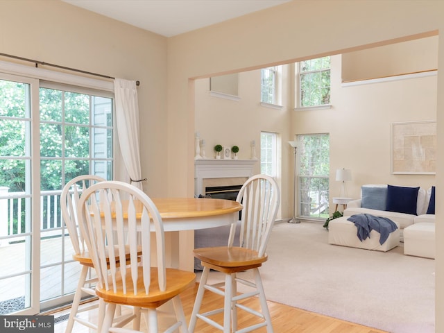 848 Sunny Chapel Rd, Odenton, MD 21113 - dining space featuring a fireplace and wood finished floors