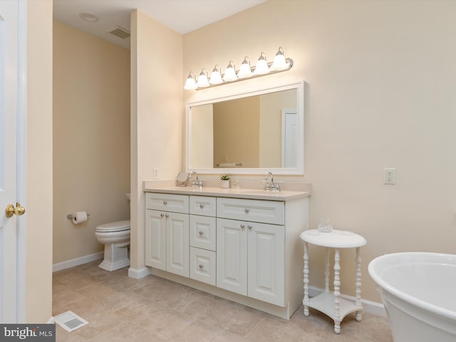 848 Sunny Chapel Rd, Odenton, MD 21113 - full bath with a freestanding tub, double vanity, and tile patterned flooring