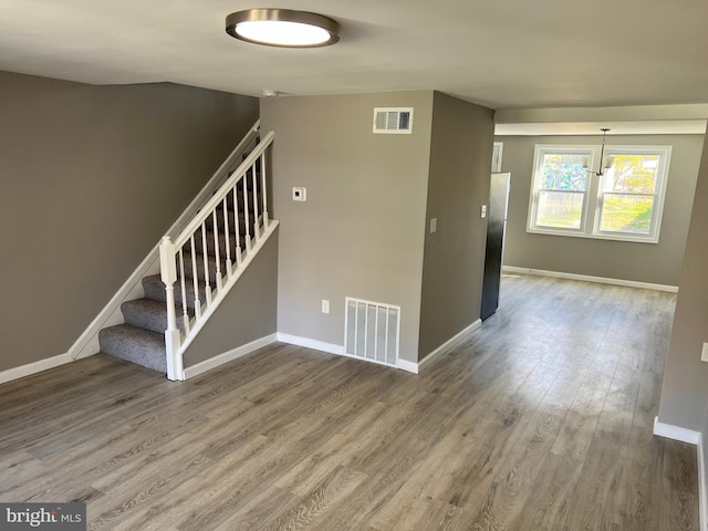 2011 Larkhall, Baltimore, MD 21222 - staircase featuring wood finished floors and baseboards