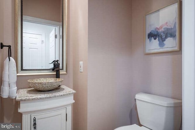 409 S Henry St, Alexandria, VA 22314 - half bathroom featuring toilet and vanity