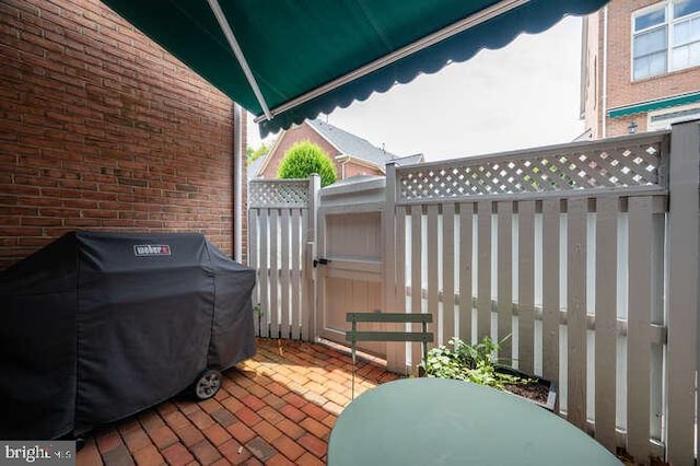 409 S Henry St, Alexandria, VA 22314 - view of patio / terrace featuring area for grilling and a gate