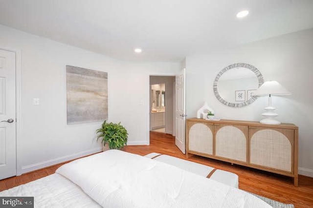409 S Henry St, Alexandria, VA 22314 - bedroom featuring wood finished floors and recessed lighting