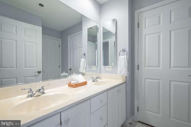 409 S Henry St, Alexandria, VA 22314 - bathroom featuring double vanity