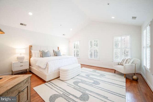 409 S Henry St, Alexandria, VA 22314 - bedroom with light wood finished floors, vaulted ceiling, and recessed lighting