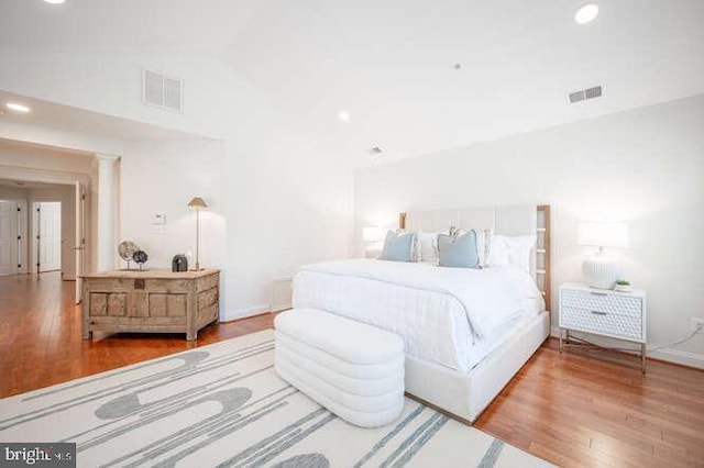 409 S Henry St, Alexandria, VA 22314 - bedroom featuring wood finished floors, lofted ceiling, and recessed lighting
