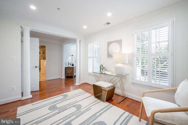 409 S Henry St, Alexandria, VA 22314 - sitting room with plenty of natural light, wood finished floors, and recessed lighting