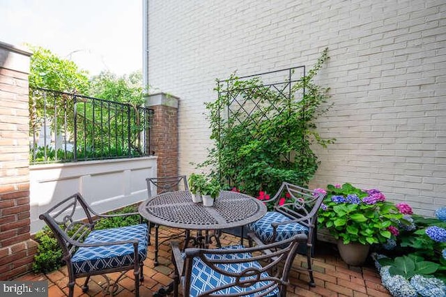 409 S Henry St, Alexandria, VA 22314 - balcony featuring outdoor dining area