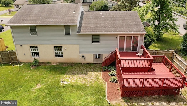 100 Constitution Ave, Reading, PA 19606 - rear view of property with a deck, a shingled roof, and a fenced backyard