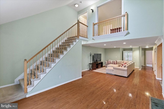 326 Brickhouse Rd, Princeton, NJ 08540 - living area featuring stairway, wood finished floors, and a high ceiling