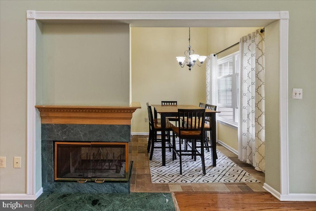 326 Brickhouse Rd, Princeton, NJ 08540 - dining room featuring a chandelier, wood finished floors, and a premium fireplace