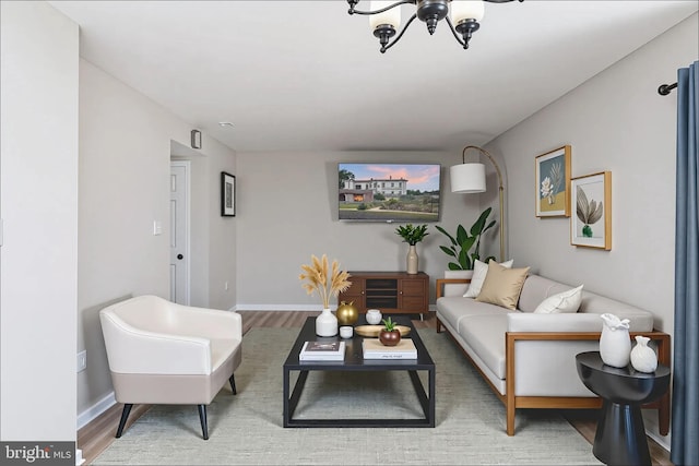 2801 Banks Ct, Dumfries, VA 22026 - living room with wood finished floors and a chandelier