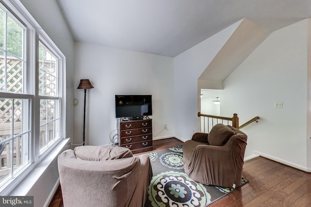 4174 La Mauricie Loop, Dumfries, VA 22025 - living area featuring dark wood-style flooring and baseboards