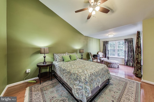 4174 La Mauricie Loop, Dumfries, VA 22025 - bedroom with wood finished floors, vaulted ceiling, and a ceiling fan