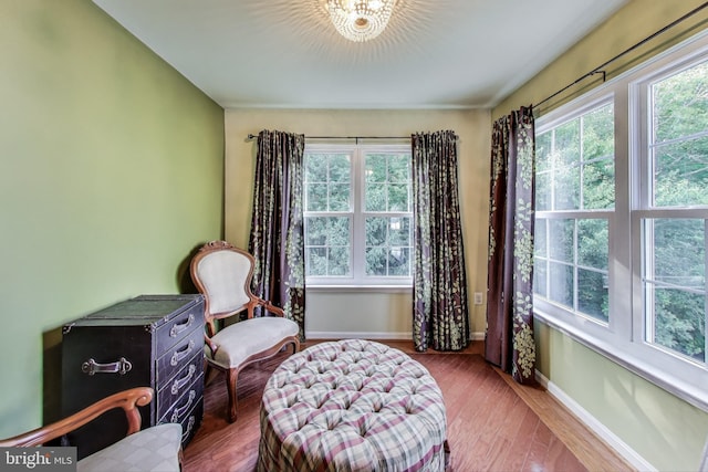 4174 La Mauricie Loop, Dumfries, VA 22025 - sitting room with plenty of natural light and wood finished floors