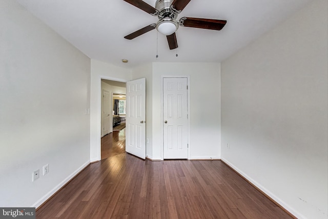4174 La Mauricie Loop, Dumfries, VA 22025 - unfurnished bedroom with dark wood-style floors and ceiling fan