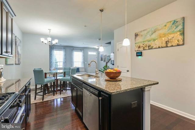 9423 Geaton Park Pl, Lanham, MD 20706 - kitchen with stainless steel dishwasher, gas range, a chandelier, dark wood finished floors, and light stone countertops