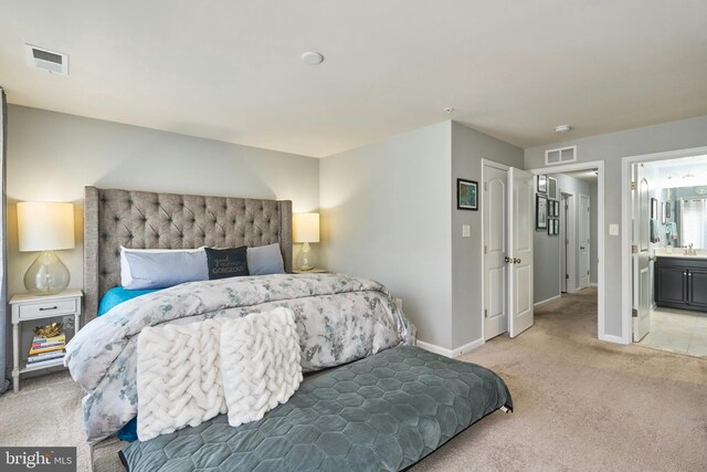9423 Geaton Park Pl, Lanham, MD 20706 - bedroom featuring light carpet and ensuite bathroom