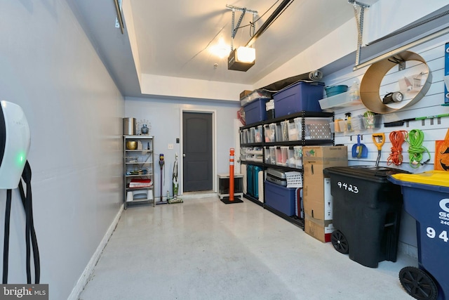 9423 Geaton Park Pl, Lanham, MD 20706 - garage featuring a garage door opener and baseboards