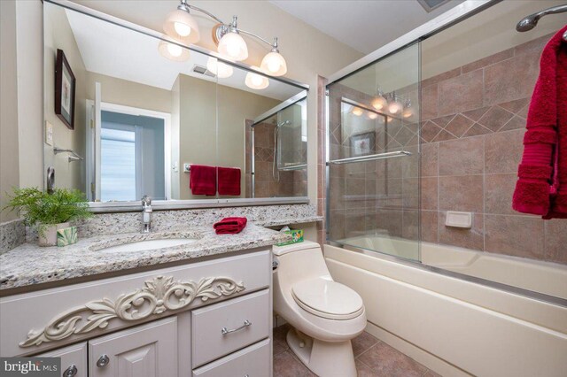 16102 Philmont Ln, Bowie, MD 20716 - bathroom featuring vanity, combined bath / shower with glass door, and tile patterned flooring