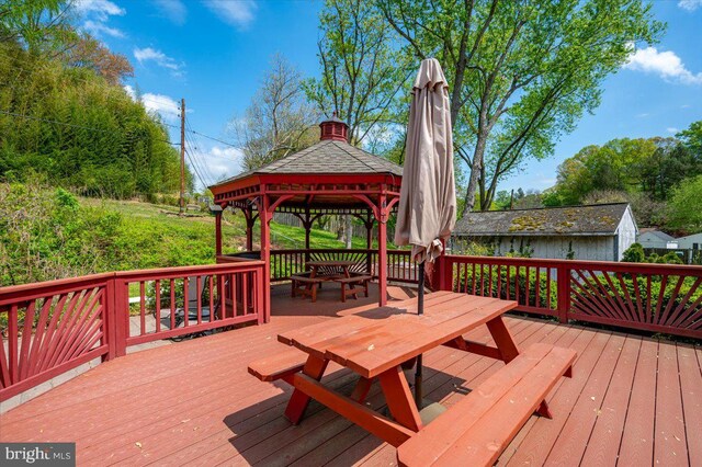 16102 Philmont Ln, Bowie, MD 20716 - wooden terrace featuring outdoor dining area and a gazebo