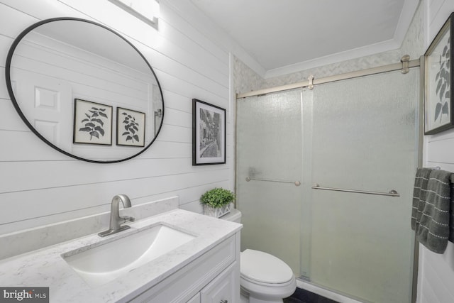 553 Choptank Cove Ct, Annapolis, MD 21401 - bathroom with vanity, a stall shower, and wood walls