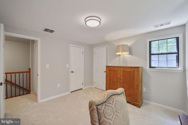 553 Choptank Cove Ct, Annapolis, MD 21401 - sitting room with an upstairs landing and light colored carpet